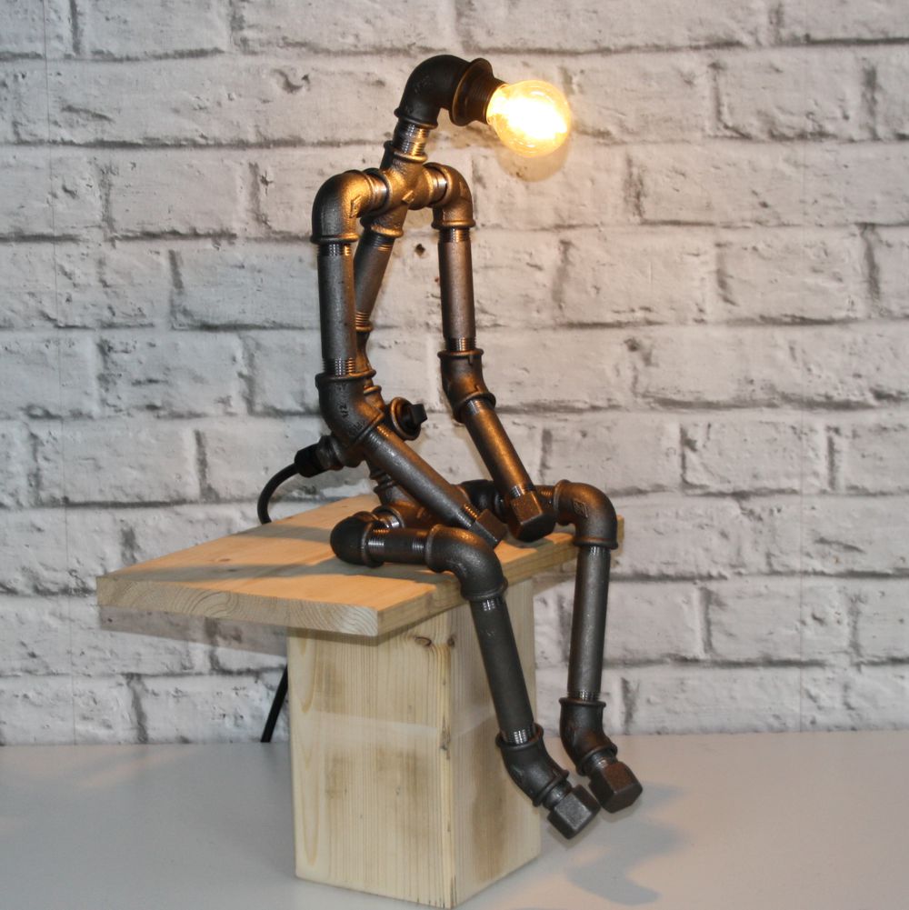 WAFI0100.jpg Figur Sitzmännchen "